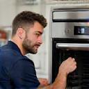 Technician installing CucinaViva appliance